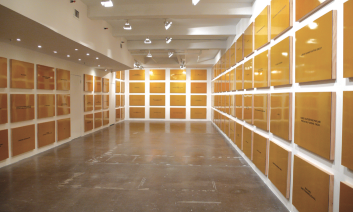 Daniel Joseph Martínez. Divine Violence, 2007. Automotive paint on wood panels, 125 parts, 24 x 36 in. each, overall dimensions variable. Installation view, The Project, New York. Courtesy Whitney Museum of American Art. Divina Violencia, 2007. Pintura para automóviles sobre paneles de madera, 125 partes, 61 x 91.4 cm, dimensión total variable. Vista de la instalación, The Project, Nueva York. Cortesía Museo Whitney de Arte Americano. Daniel Joseph Martínez. Divine Violence, 2007. Automotive paint on wood panels, 125 parts, 24 x 36 in. each, overall dimensions variable. Installation view, The Project, New York. Courtesy Whitney Museum of American Art. Divina Violencia, 2007. Pintura para automóviles sobre paneles de madera, 125 partes, 61 x 91.4 cm, dimensión total variable. Vista de la instalación, The Project, Nueva York. Cortesía Museo Whitney de Arte Americano.
