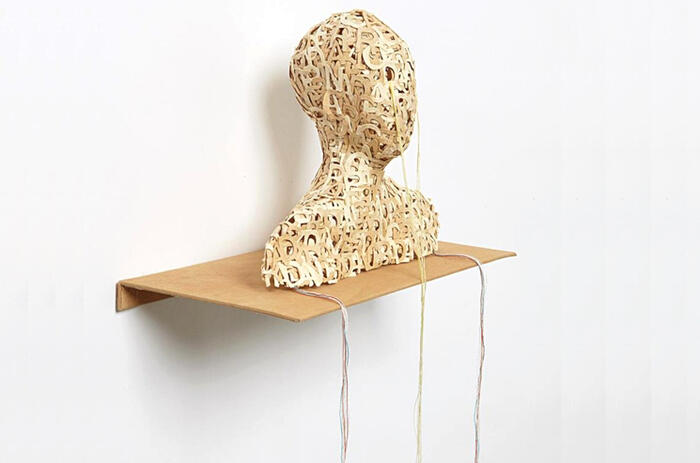 LESLEY DILL HEAD, 2003 cast, die-cut pigmented abaca paper letters with thread, stainless-steel shelf covered in tea stained muslin cloth, Edition of 25 6 x 7 x 3 1/2 in. 15.2 x 17.8 x 9 cm. LESLEY DILL HEAD, 2003 cast, die-cut pigmented abaca paper letters with thread, stainless-steel shelf covered in tea stained muslin cloth, Edition of 25 6 x 7 x 3 1/2 in. 15.2 x 17.8 x 9 cm.