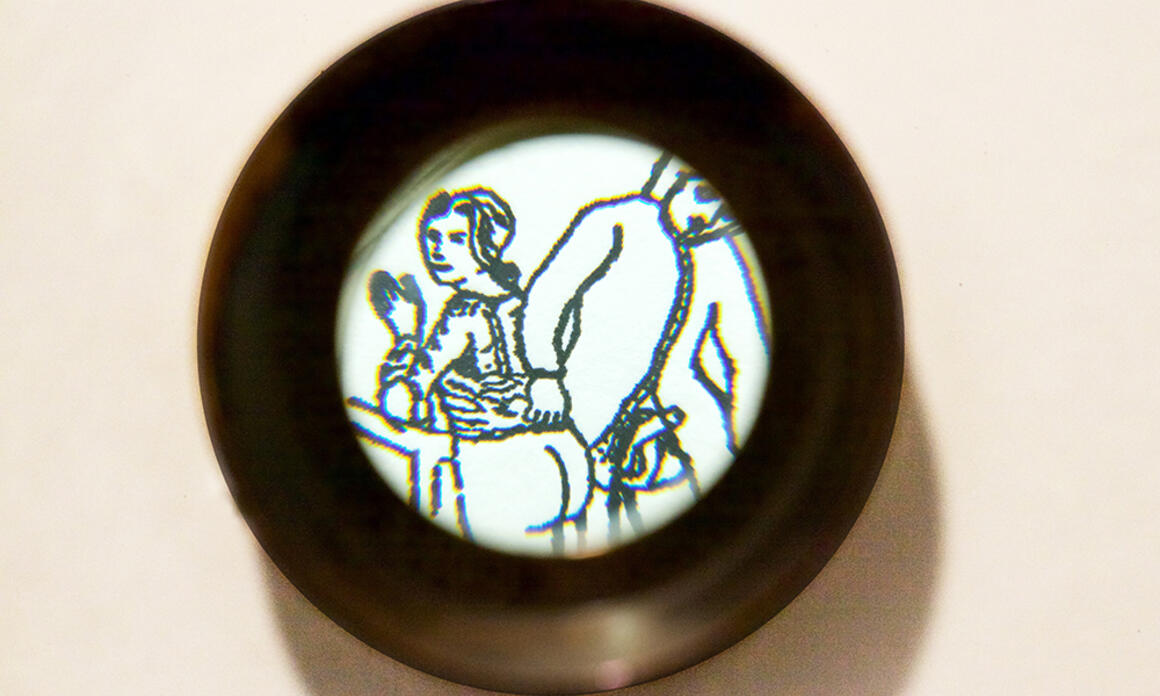 Carlos Motta, La puissance et la jouissance, 2015. Installation of twenty letterpress printed drawings (2.5 x 3.8 cm. each) with magnifying glasses and fluorescent light bulbs. 